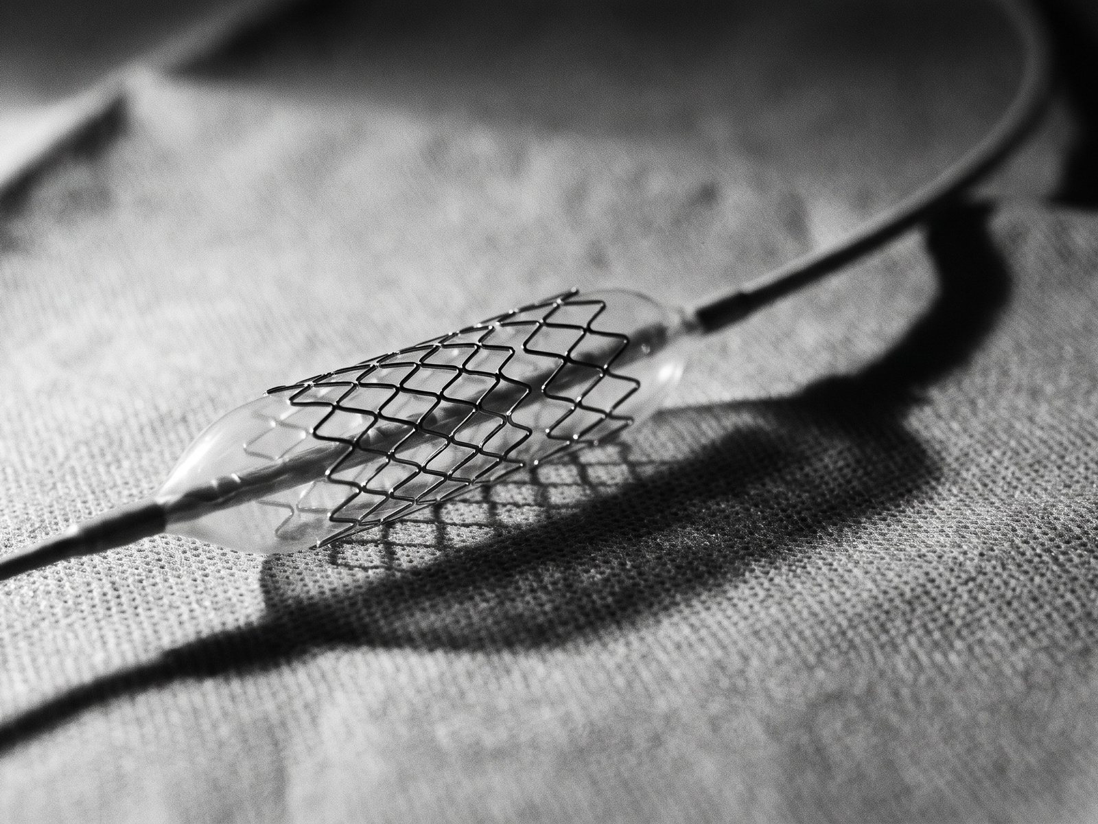 A coronary stent mounted on an angioplasty balloon catheter (illustrative image)